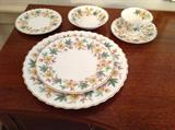 Royal Doulton Chatsworth yellow / green 33 piece china - $ 200.00.  Set includes 4 dinner plates, 4 salad plates, 4 bread plates, 8 cups / 8 saucers, vegetable bowl, 4 fruit bowls.