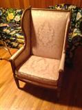 Wood trim upholstered wingback chair $ 100.00