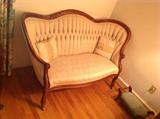 Vintage wood trimmed loveseat $ 360.00 - 58" wide x 30" deep x 33.5" tall.
