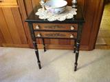 Oriental accent 2 drawer table $ 80.00 - 20" wide x 16" deep x 29" tall.