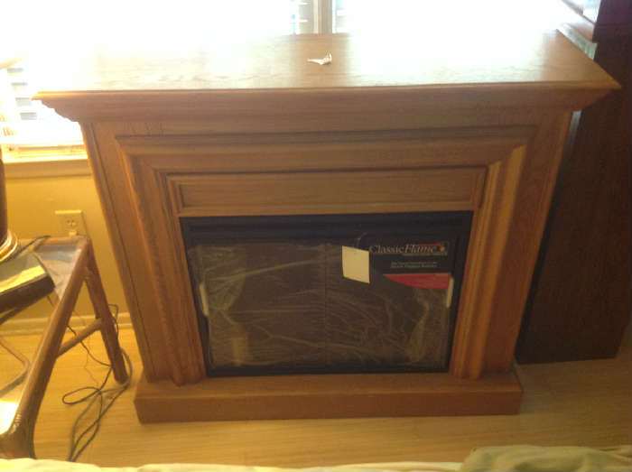 Fireplace / heater / mantle $ 200.00 (never used)