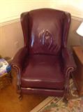 Tack leather / wingback chair $ 160.00 (small rip along foot rest / bottom)