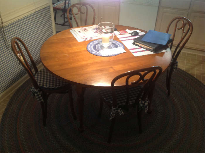 Dining Table - 27" high x 50.5" wide x 50.5" deep - walnut with cherrywood secondary, multi plank overhanging rount top with 4 Thonet style Romanian chairs - $ 400.00