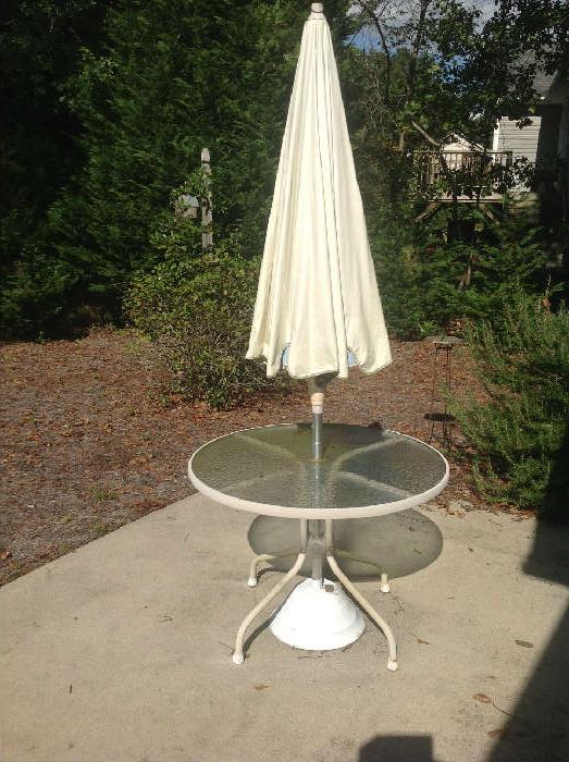Glass top table / Umbrella / Stand - $ 60.00