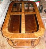 Glass topped coffee table - $ 150.
