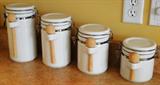 Item # K1 - set of (4) ceramic storage cannisters $ 30.00 for all 4.