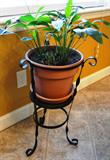 Item D6 - Plant stand and pot $ 30.00.