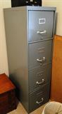 Item O9 - 4 Drawer file cabinet $ 50.00