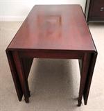 Item DR8 Fold up 8 legged antique solid wood dining room table $ 250.00