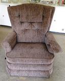 Item FR12 Mauve colored uphostered recliner $ 75.00