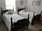 Item BD2-1 Antique solid wood twin beds - includes mattresses / box springs and bedding $ 250.00