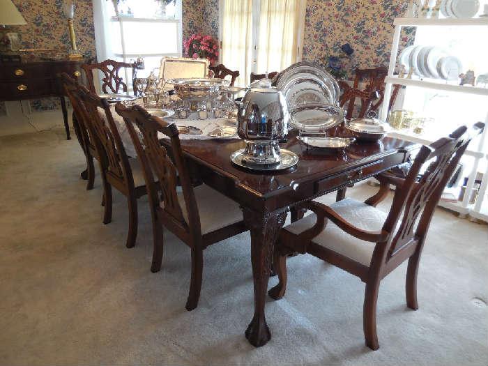 Large Mahogany Dining Table, 3 leaves, pads, drawer on each end, 10 chairs.