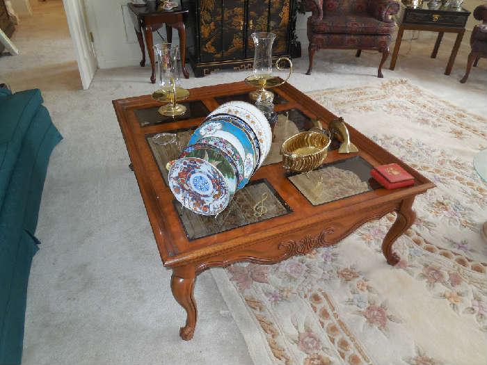 Oriental Plates on Glass and Wood Coffee Table
