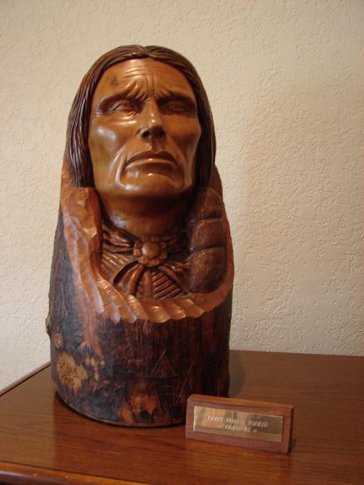 Quanah Parker, Commache Chief, wood carving is large and impressive.