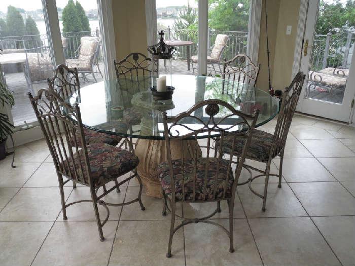 Glass Table  with wrought Iron chairs $725