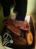                         Box full of baseball gloves