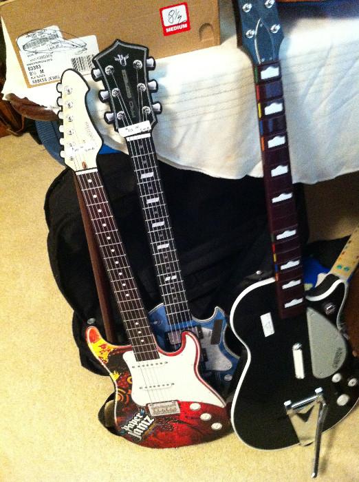                      "Play" guitars and real guitars