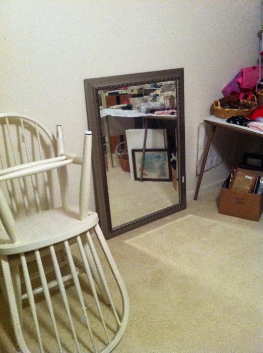              2 of 4 white chairs; 1 of several mirrors