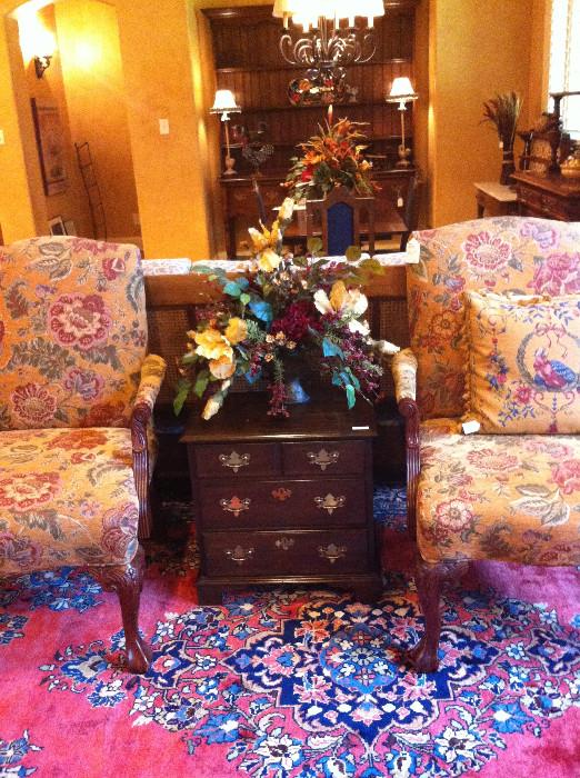           Matching arm chairs; small chest with lovely arrangement