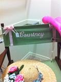             "Courtney" director's chair; spring hat