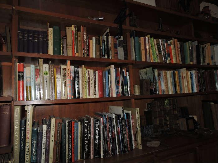 lots of books. Bookshelf pictured is not for sale as it is built in.