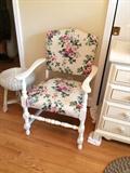 Wonderful antique chair painted white and cleanly upholstered. 