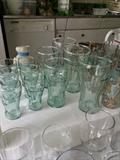 Vintage Coca Cola glasses in three sizes.