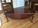 Solid wood, antique Large Queen Anne drop leaf style coffee table.