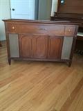 Wonderful old stereo system console. Completely empty for storage or a restored system.