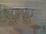 Very fun monogrammed vintage silver edged roly poly glasses.
