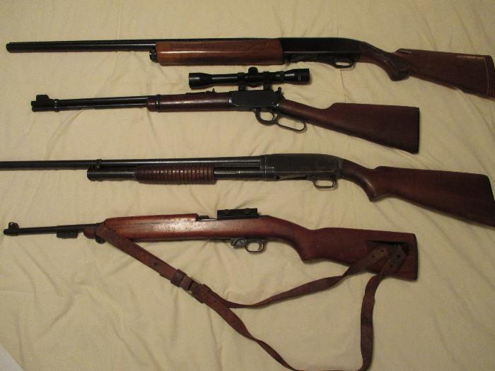 Winchester Model 1400 12 gauge, Winchester Model 9422 M .22 Magnum w/ scope, Winchester Model 12-12 ga, Remington Model 700 .264 Mag