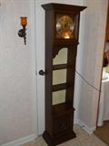 Electric cabinet clock with display shelves