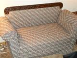 Antique settee with newer upholstery