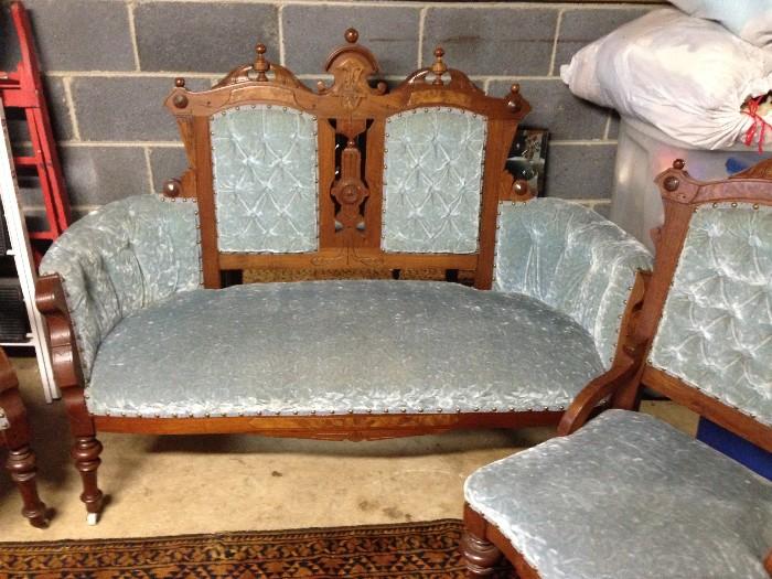 Queen Anne parlor set.  Loveseat, King Chair, Queen Chair and 4 sitting chairs.  Original fabric. Circa 1890s.