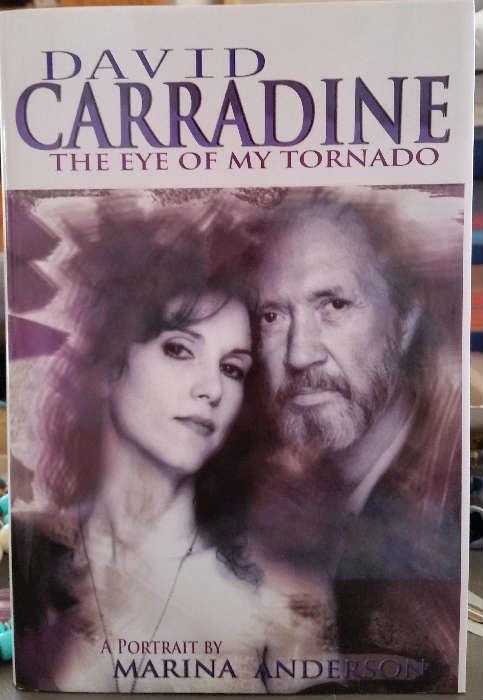 Numerous copies of "David Carradine The Eye Of My Tornado" books written by Marina Anderson former wife of celebrity David Carradine.