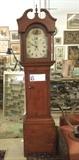 Antique Scottish tall case clock with painted metal face and pine case