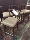 Top of the line set of 4 McGuire leather wrapped rattan bar stools with leather seats