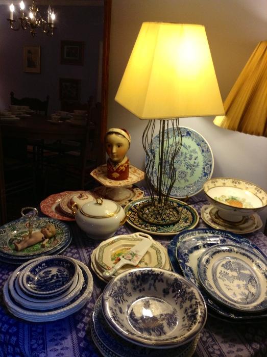 A wide assortment of transfer-ware plates