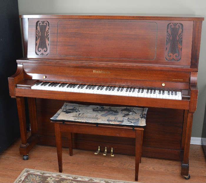 Baldwin upright Concert piano - it has a beautiful sound !