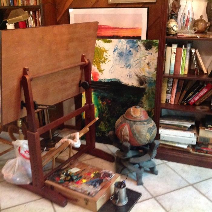 Artists easel, paints, brushes