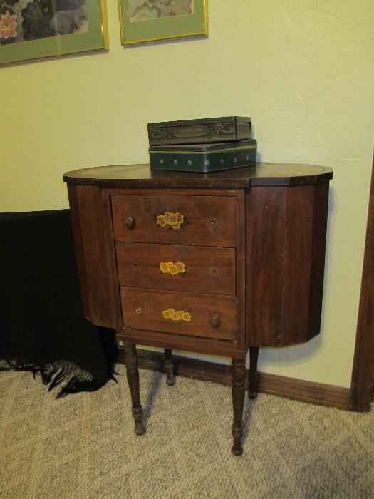 antique sewing cabinet, tins
