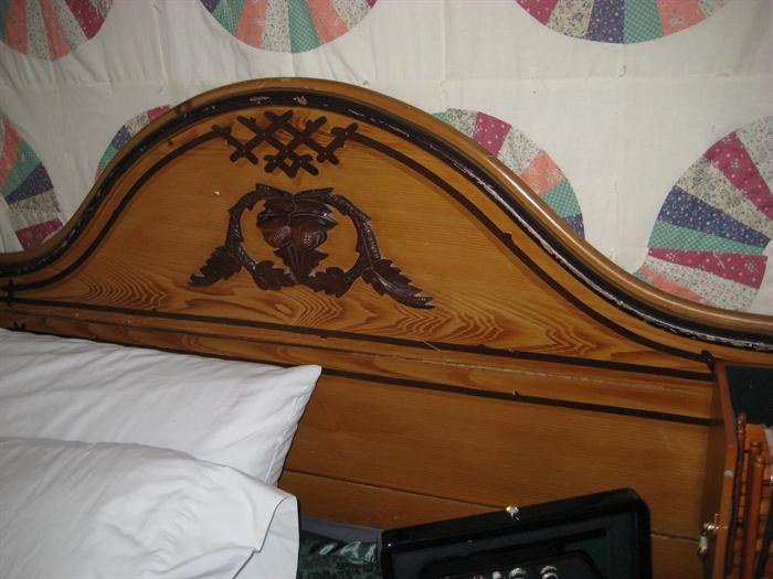 Bed for sale, wood headboard detail.
