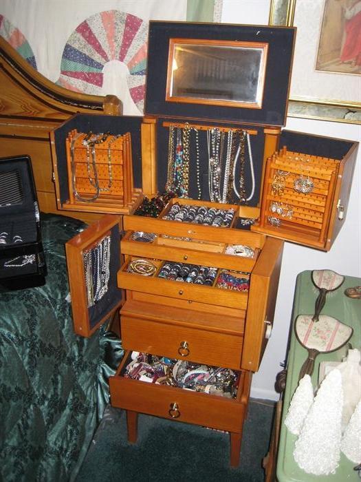TONS of costume jewelry and hundreds of watches for sale.