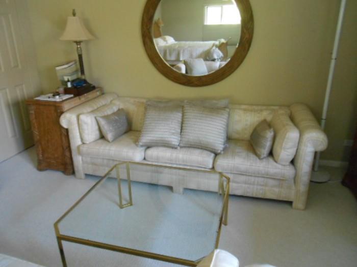 lovely sofa with tables and mirror