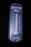 There is a good selection of collectible metal signs and thermometers