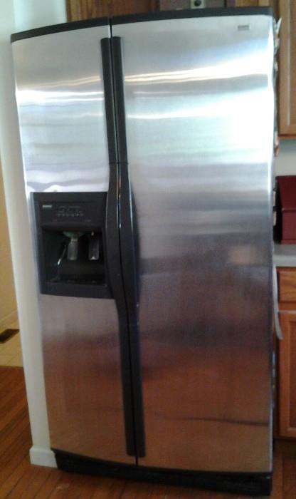 Stainless Side by Side Refrigerator with Ice and Water in Door.  14 yrs old in Excellent Condition.