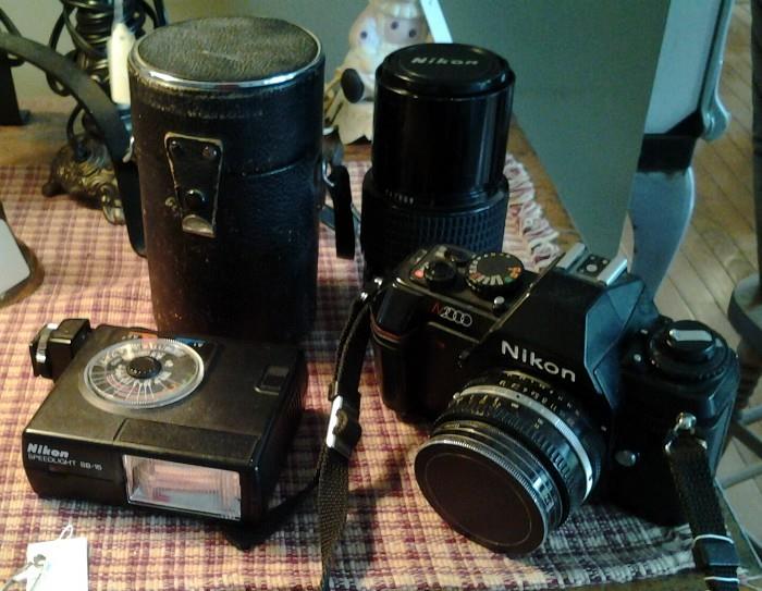 Nikon N2000 Camera with SB Speedlight Flash, 200 MM F14 Lens, & Vivitar f=135mm No. 119010844 Lens