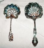 2 Antique Sterling Silver Pierced Serving Spoons consisting of (1) c. 1900 R. Blackinton Helena Bon Bon Spoon (left) and (1) c. 1900's Whiting Sterling Silver Floral Handle Pierced Spoon