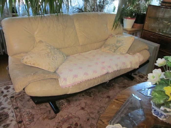 Leather sofa (poor condition).  Good frame and style.  Needs to be recovered or restored.