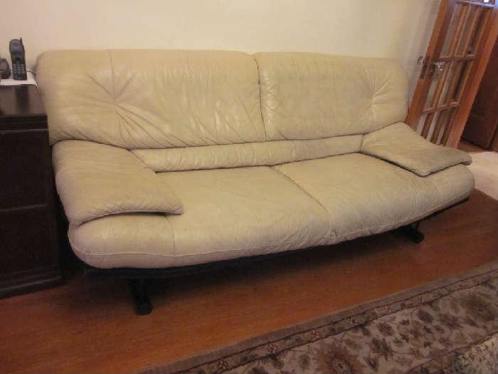Leather loveseat; could use some TLC.